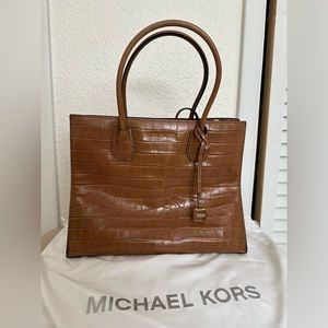 Michael Kors brown Snakeskin purse with unused detachable strap.